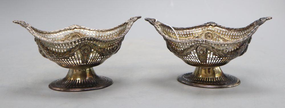 A pair of late Victorian pierced silver oval bonbon baskets by Charles Stuart Harris, London, 1897, 15.8cm, 9 oz.